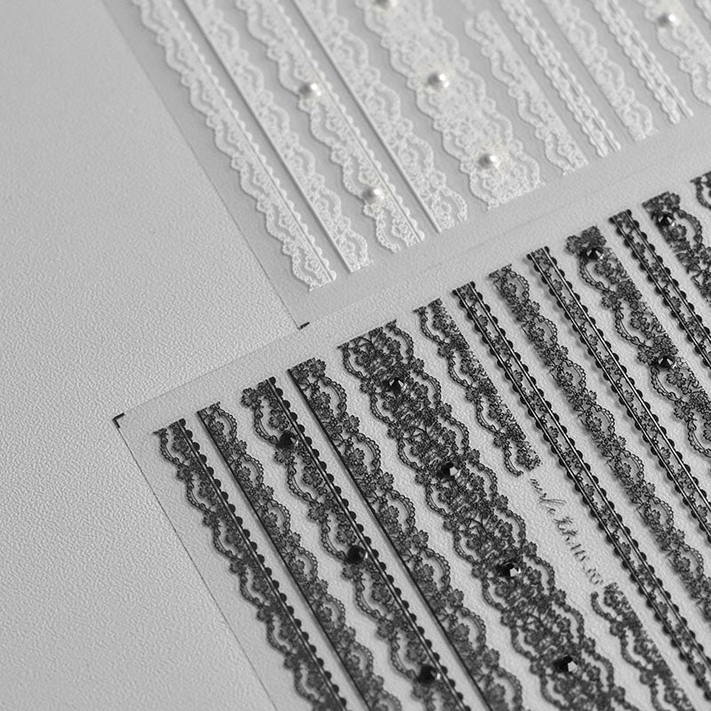 TOMONI Kynsitarrat, Lace