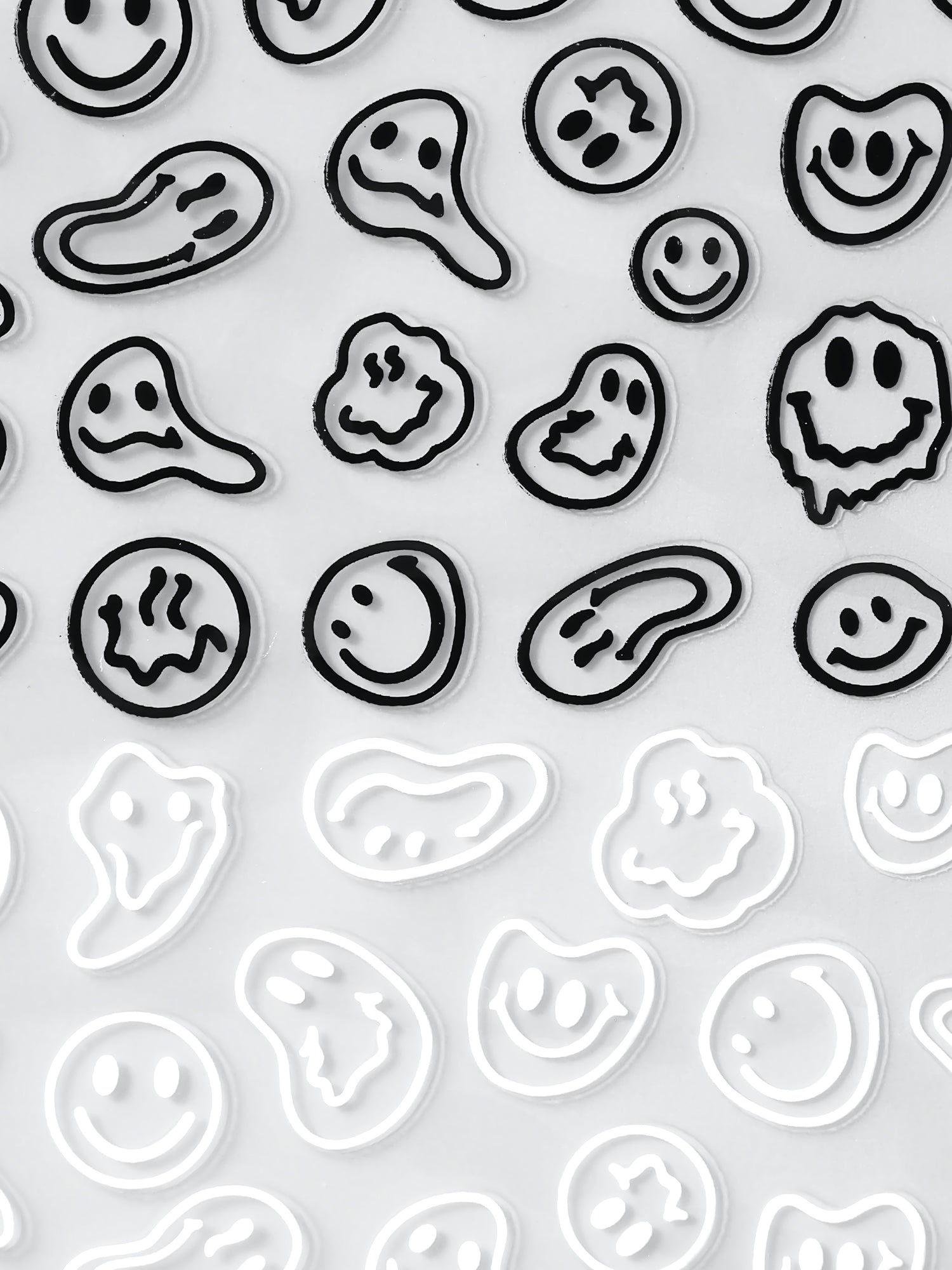 Aha! Kynsitarrat, Smiley Black & White 022