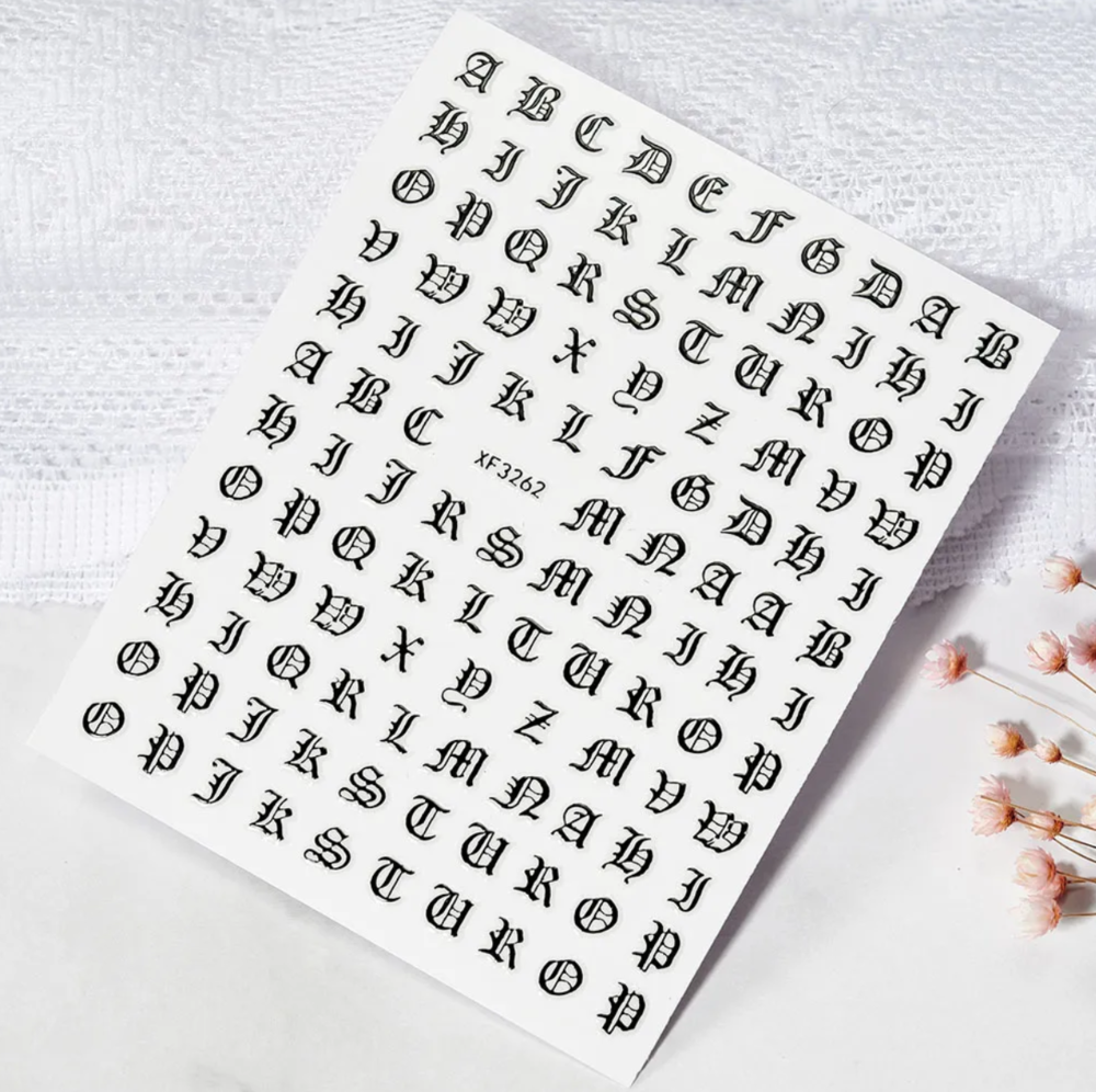 Kynsitarrat, Letters Musta