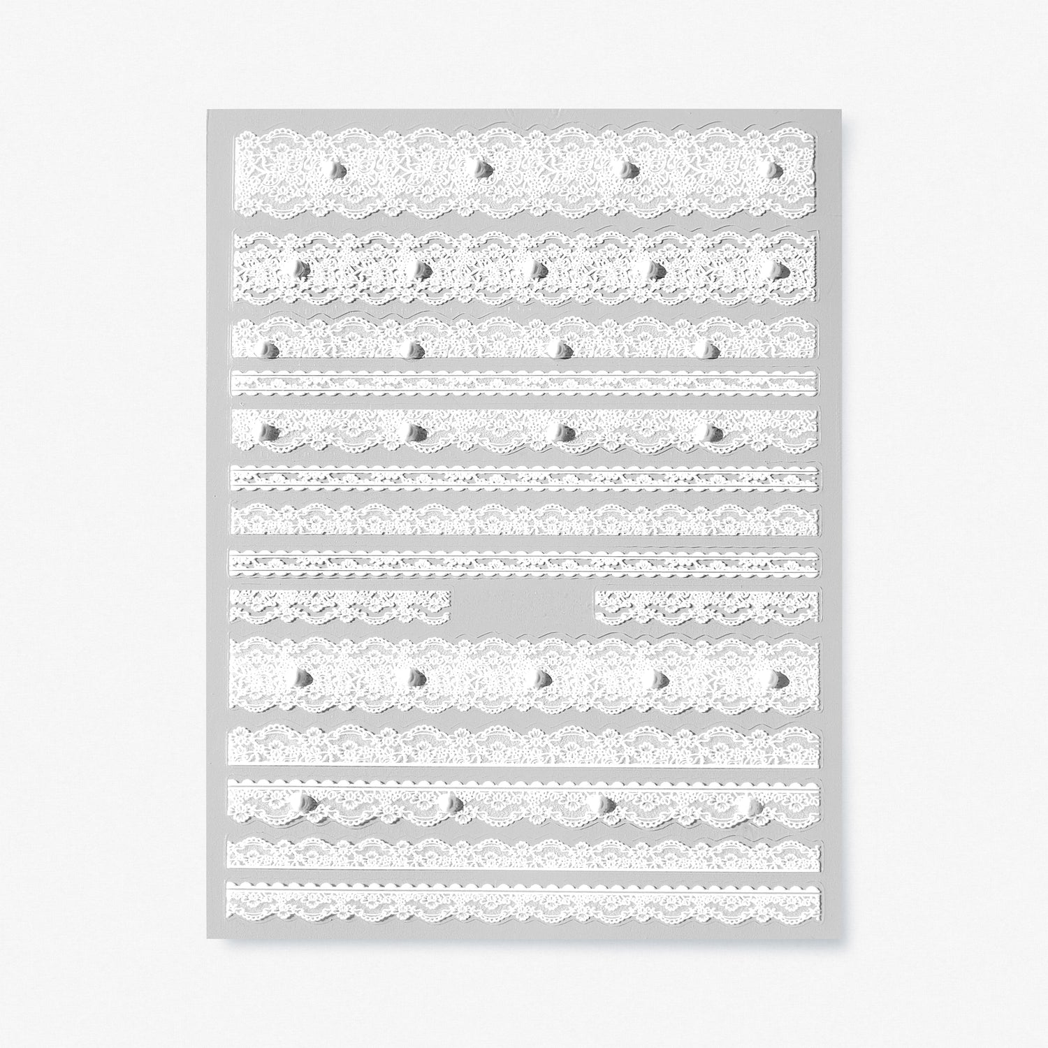 TOMONI Kynsitarrat, Lace