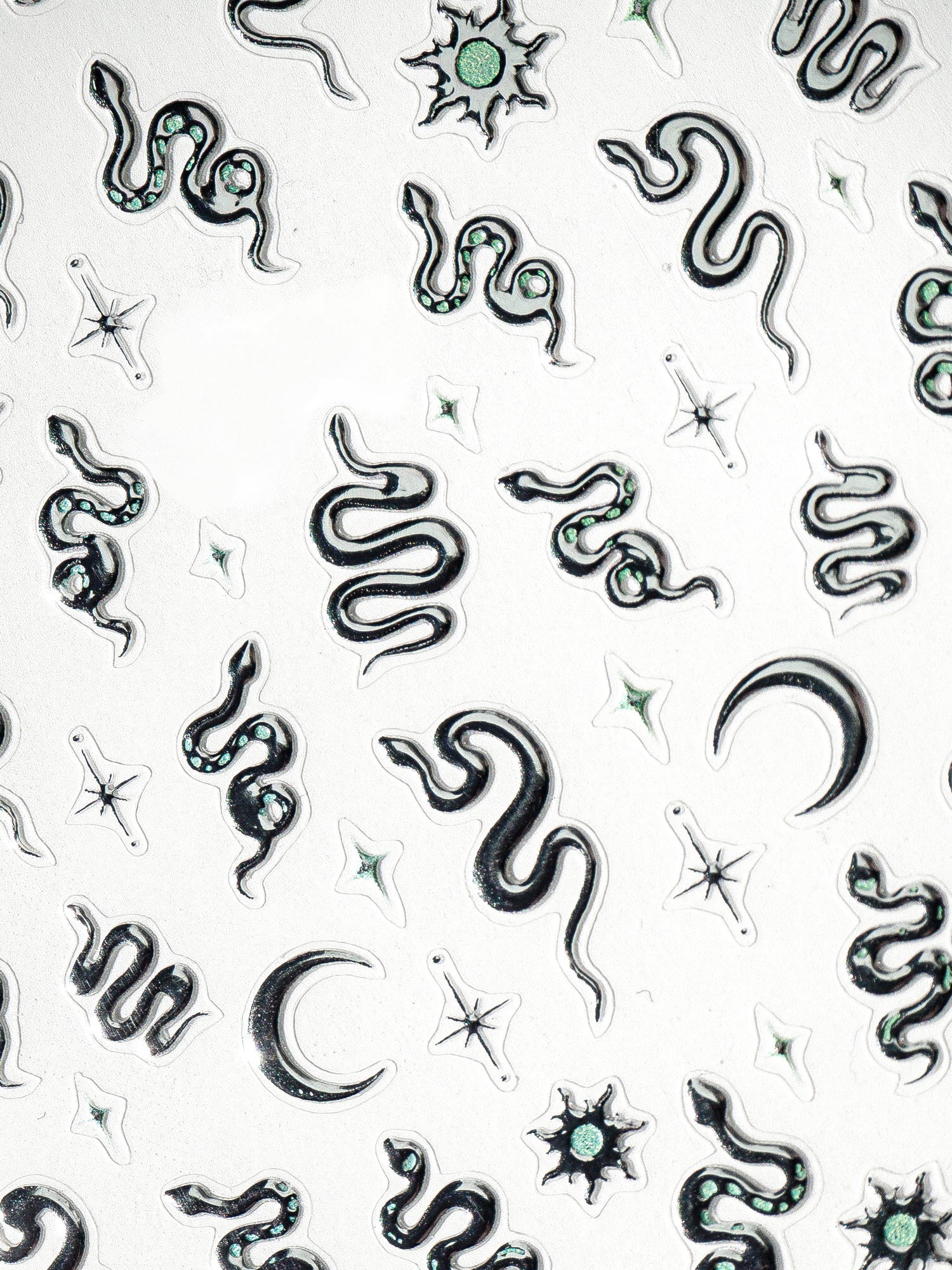 TOMONI Kynsitarrat, Chrome Snakes