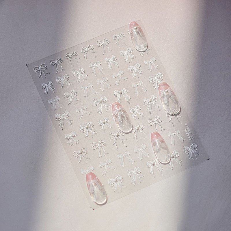 TOMONI Kynsitarrat, Lace Bows